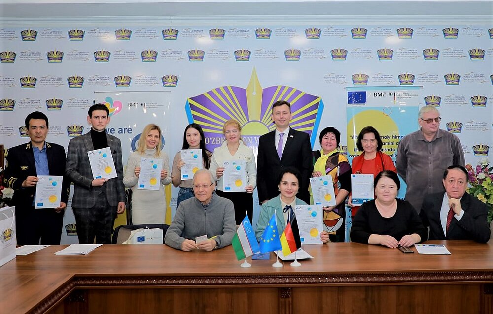 Winners of marathon and jury on a stage